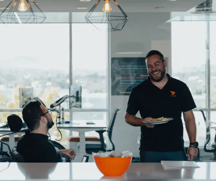 Kezber team members in the office kitchen